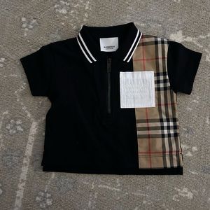 Burberry polo shirt.